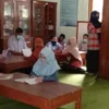 Tumbuhkan Minat Baca Warga SMPN 1 Sragi Melalui Gerakan Pasti Baca Pasti Bisa